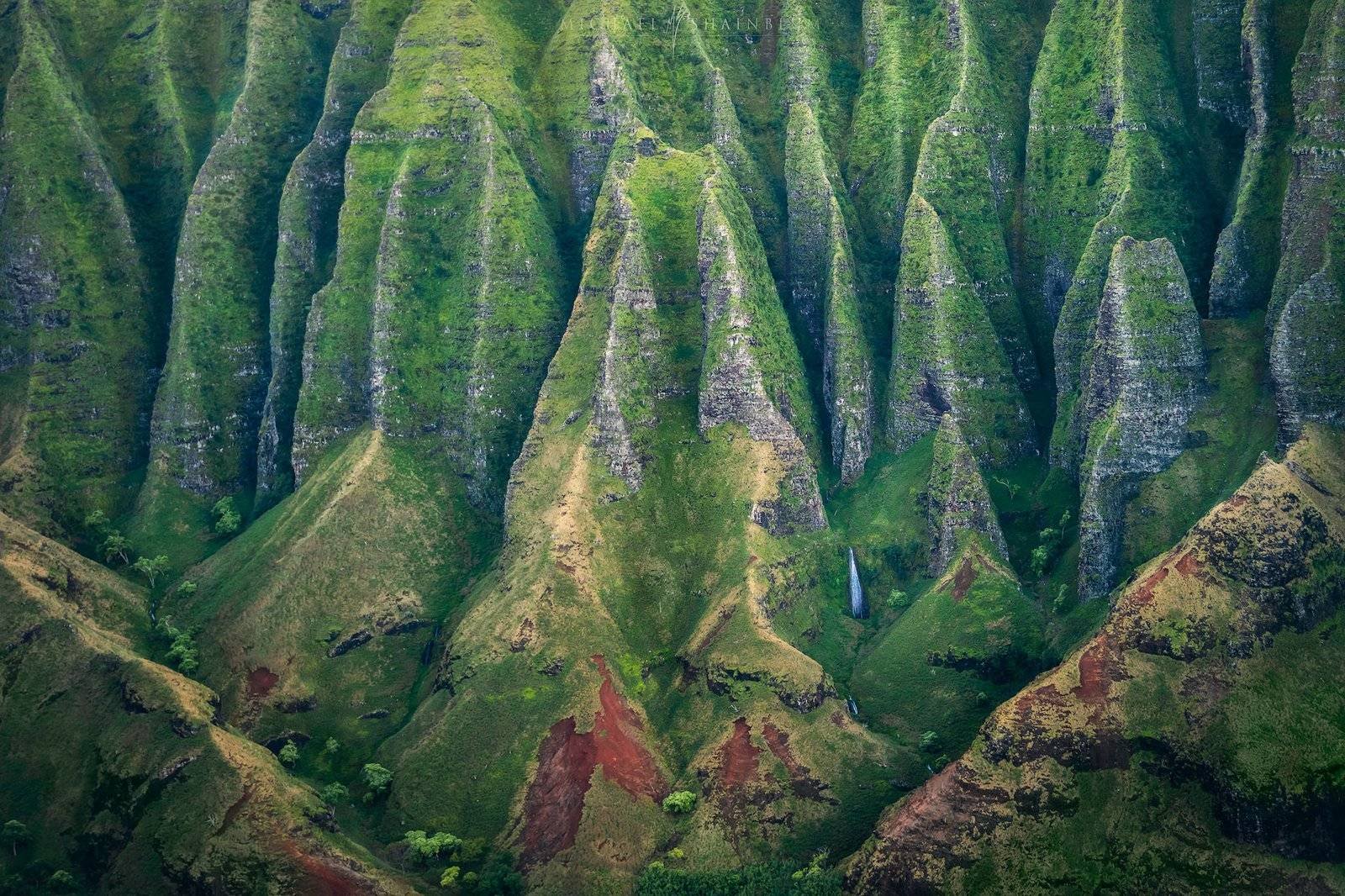 Hawaii aerial helicopter photography Na Pali coast Kauai commercial drone landscape